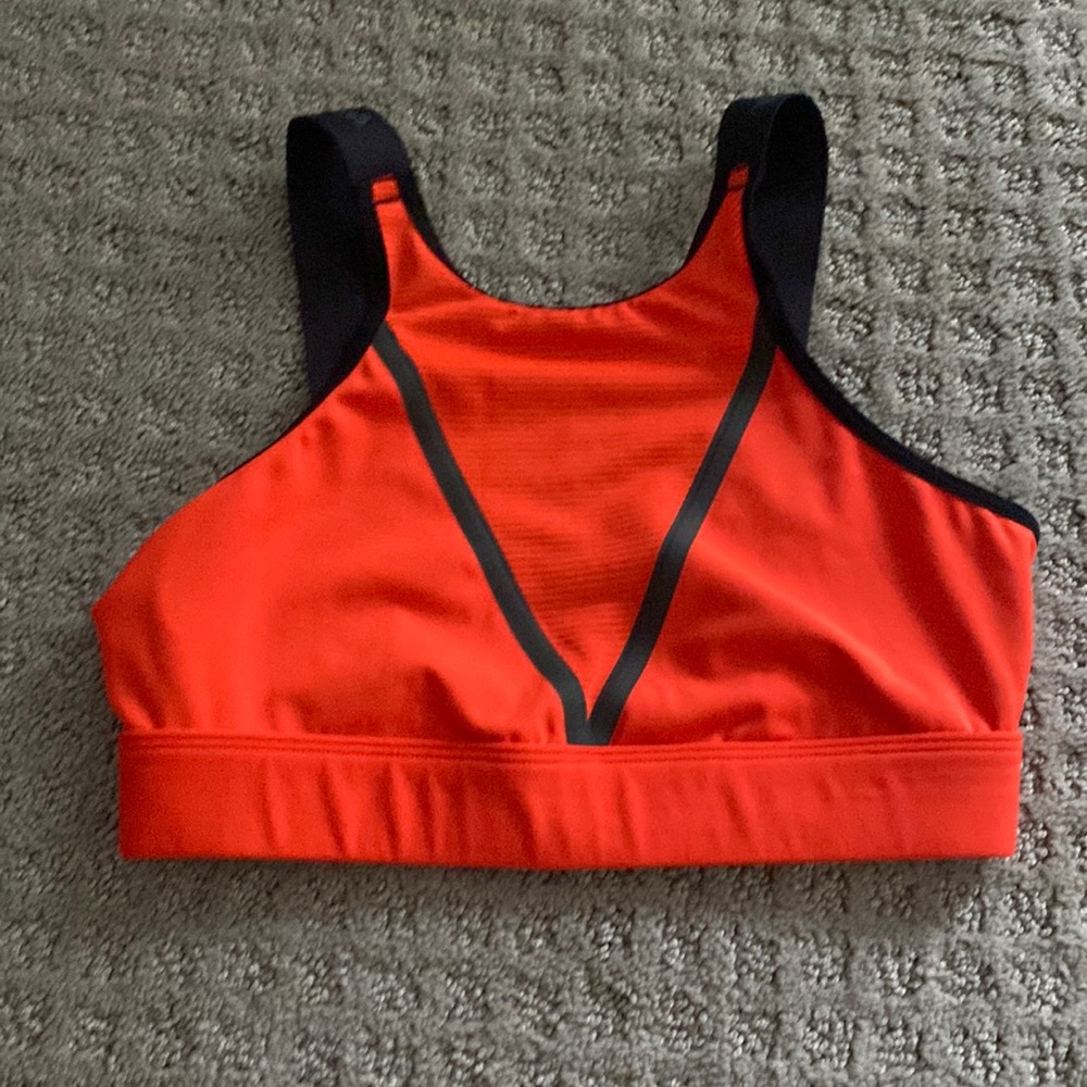 womens bright orange and black sports bra